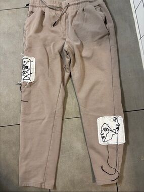 Maniere de voir Beige Sweatpants with Abstract Face Patches  worn once size l